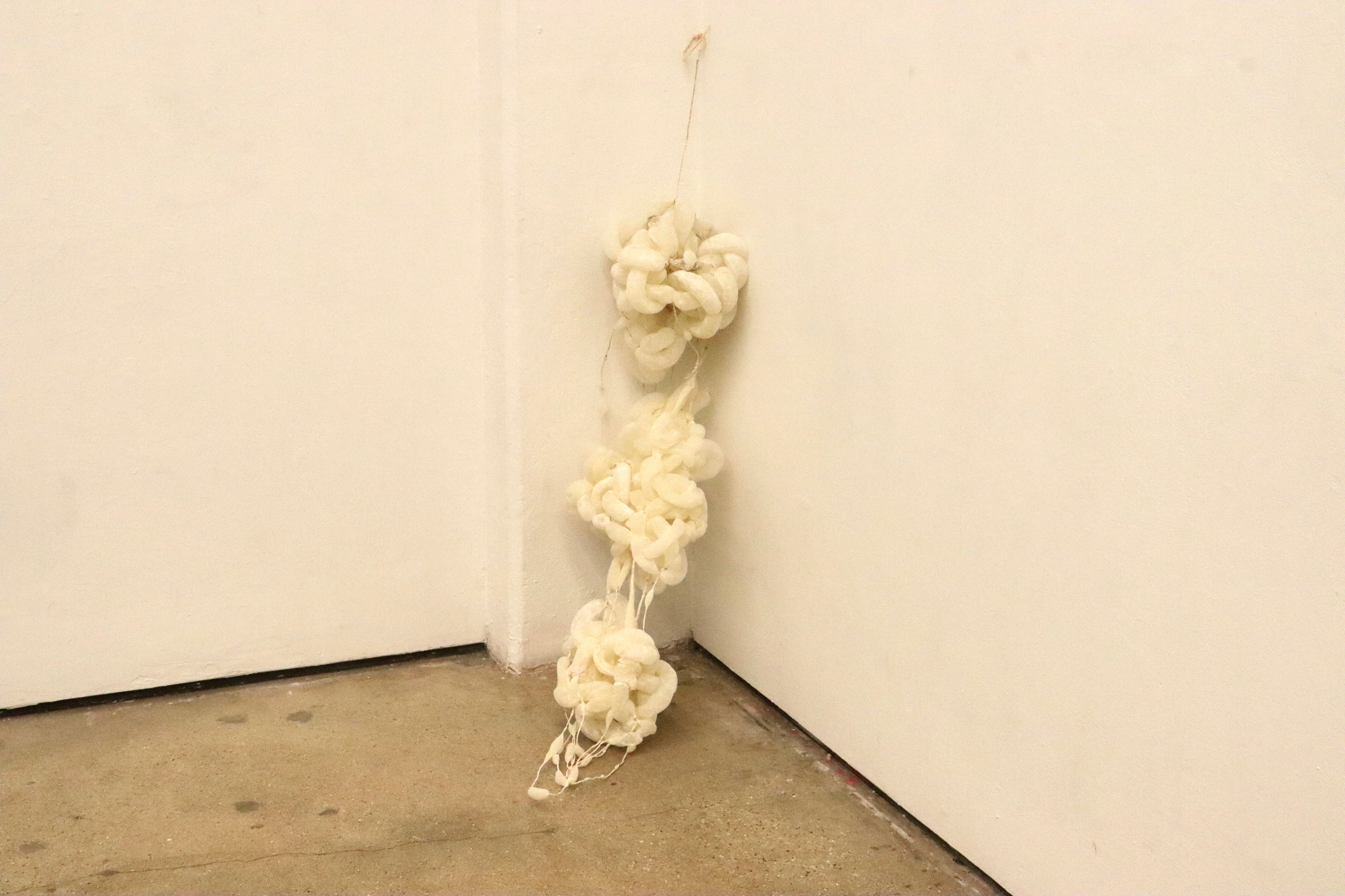 Held at the Edge sculpture by oneg - fragile balance between structure and collapse